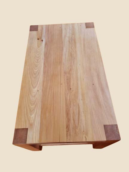 Kauri coffee table with magazine rack